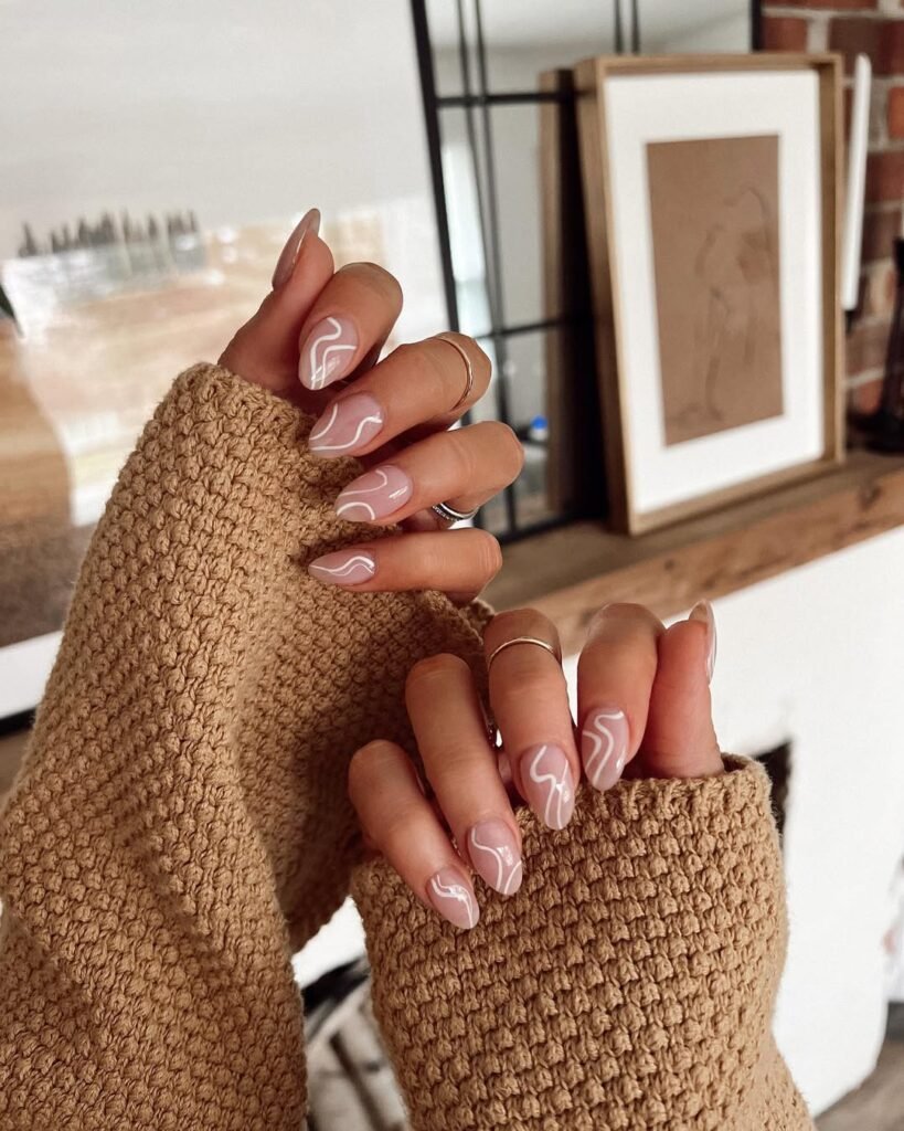 elevated swirl nail design for april