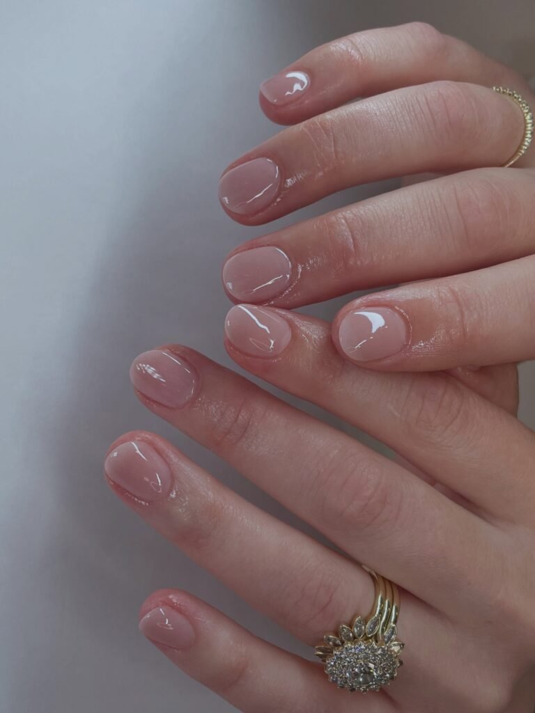 Short soap nails with a sheer pink glossy finish