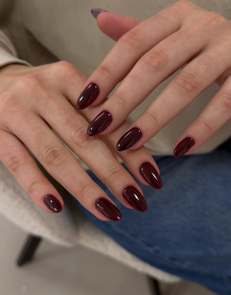 burgundy nails on almond shape, glossy wine red November 2026 manicure