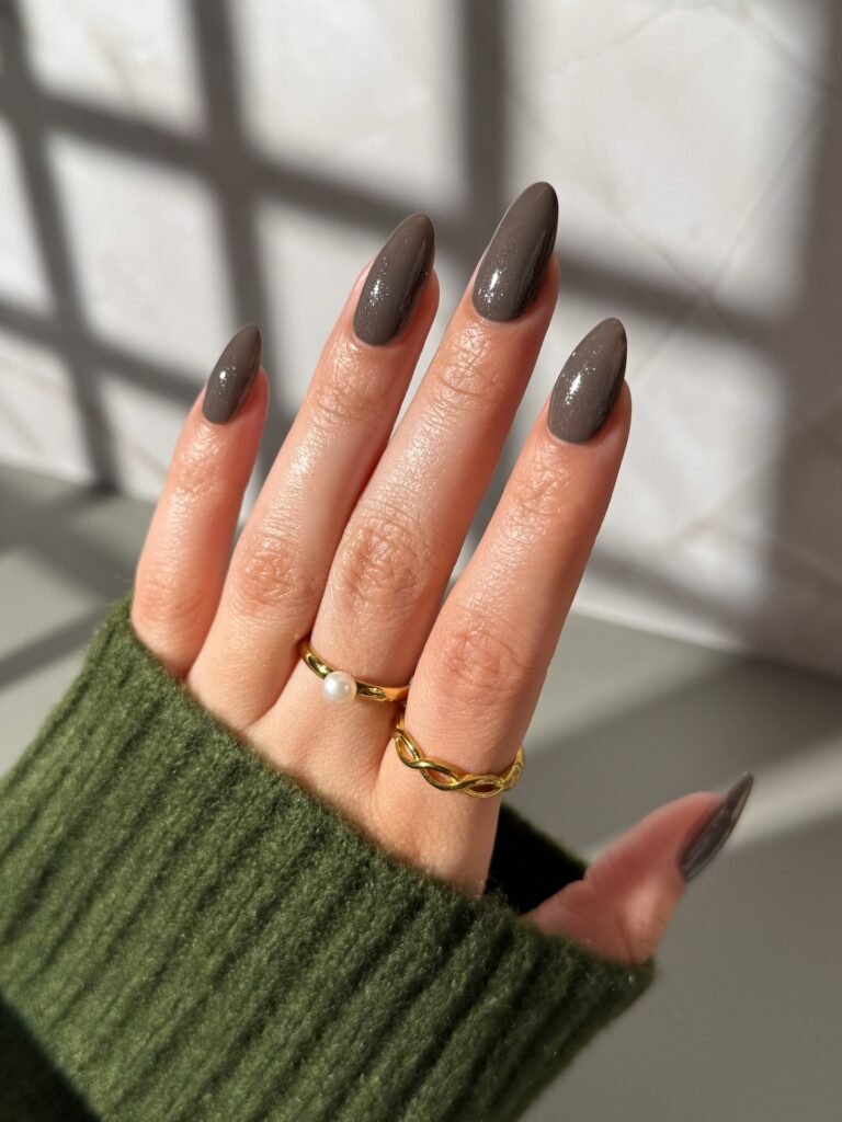 dark greige taupe nails with subtle shimmer, long almond fall 2026 manicure