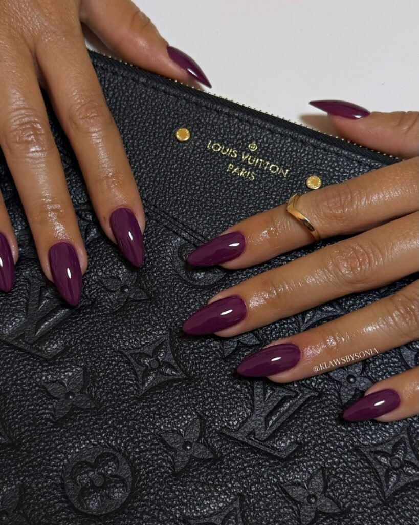 plum purple nails on long almond shape, glossy November 2026 manicure